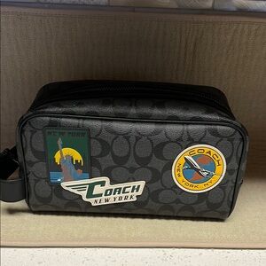 Coach Black Toiletry Bag with Durable Design